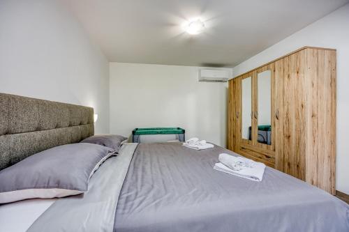 Katil atau katil-katil dalam bilik di House Milka with Whirlpool and Sauna