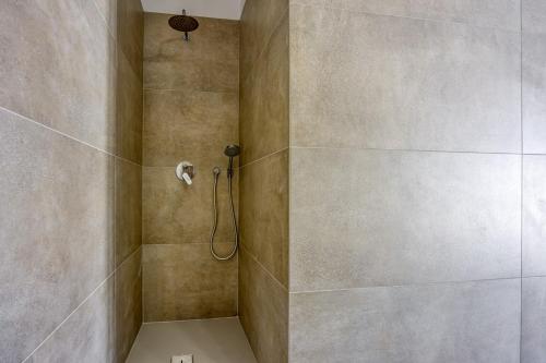 Bilik mandi di House Milka with Whirlpool and Sauna