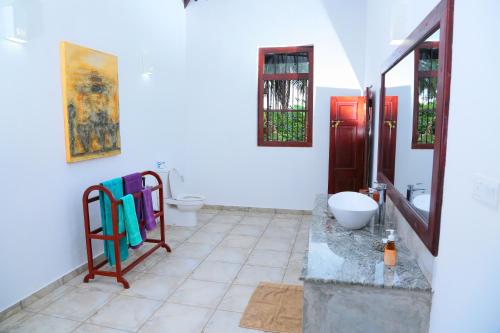 Ванная комната в Shangri-lanka Villa