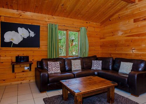 Χώρος καθιστικού στο Quarry Walk Lodges
