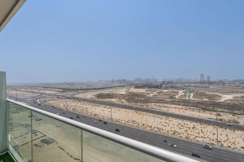 an aerial view of the freeway at Cosy Studio in Damac Hills - Sleeps 2 in Dubai Marina