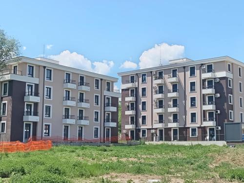 an image of three apartment buildings at Apartmani Slatinska Oaza in Vrnjačka Banja