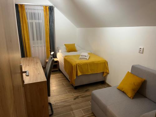 Apartmány u Mrázaにあるベッド
