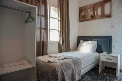 Postel nebo postele na pokoji v ubytování İMREN'S OTEL