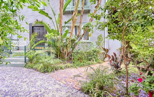 a house with a black door and some plants at Hollywood Home in Los Angeles