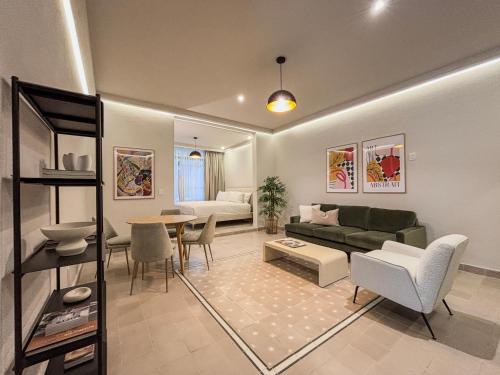 a living room with a couch and a table at CASA MIA by SERRA HOSPEDAJE in Guadalajara
