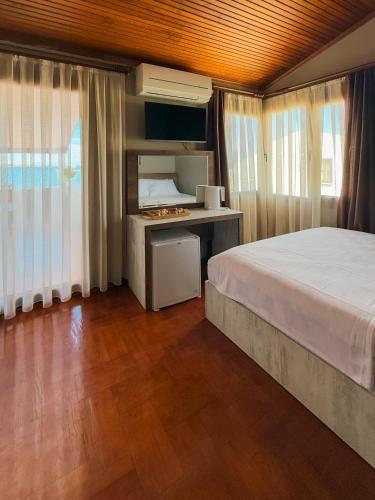 Katil atau katil-katil dalam bilik di Tare Suites