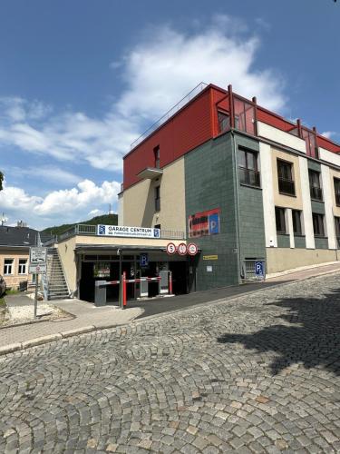 a building on the side of a street at Apartmán 7 - Petřín in Karlovy Vary