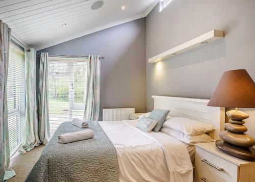 Ένα ή περισσότερα κρεβάτια σε δωμάτιο στο Ladera Retreat Lodges