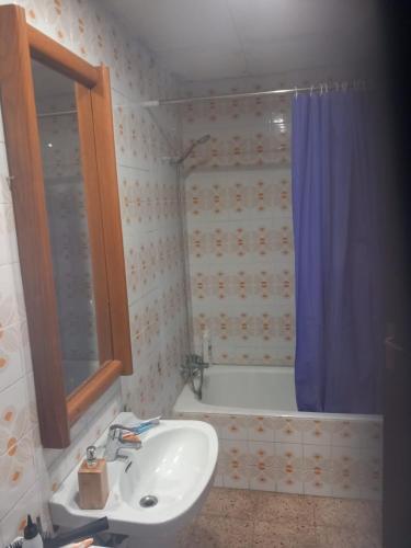 a bathroom with a sink and a shower and a tub at habitacion a 15 min playa d aro in Romanyá de la Selva