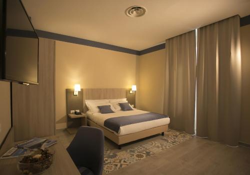 Ένα ή περισσότερα κρεβάτια σε δωμάτιο στο Map holiday residence
