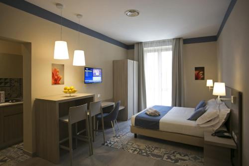 A bed or beds in a room at Map holiday residence