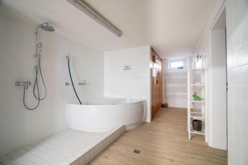 Koupelna v ubytování Das Solaris 18 Beach Apartment mit Gemeinschaftssauna und Grillplatz