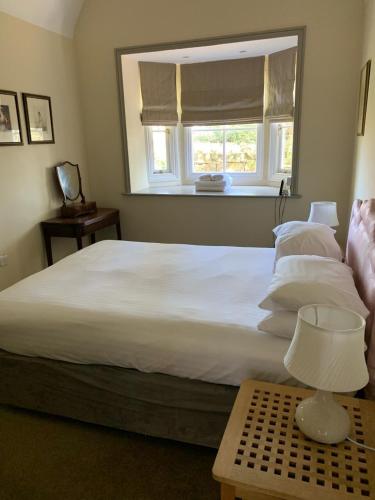 Thornton Manor - Holiday Cottages and Apartmentsにあるベッド