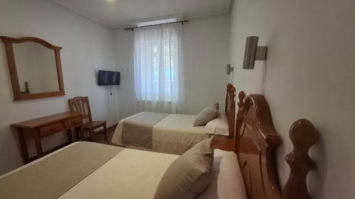 Μια τηλεόραση ή/και κέντρο ψυχαγωγίας στο Hostal Bellas