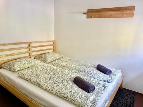 Cama o camas de una habitación en Apartmenthotel Karawankenblick