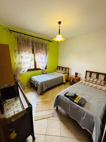 Giường trong phòng chung tại villa katerina