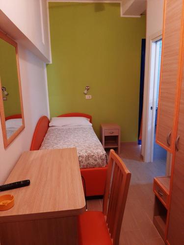 Postel nebo postele na pokoji v ubytování Hotel Consul