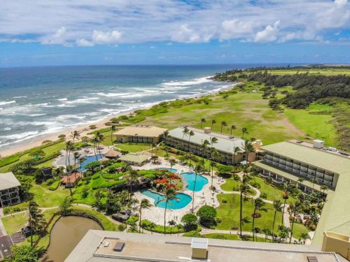 an aerial view of the resort and the ocean at Idyllic Yet Simple Oceanfront Resort Stay in Lihue