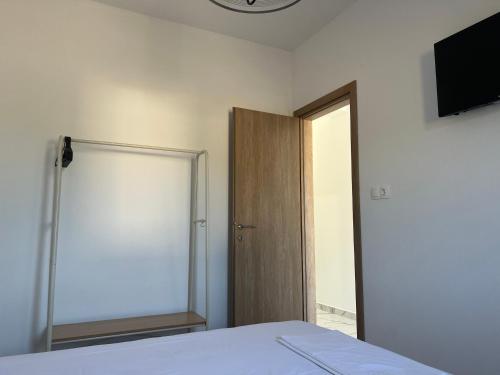 Postel nebo postele na pokoji v ubytování Zohavillas white
