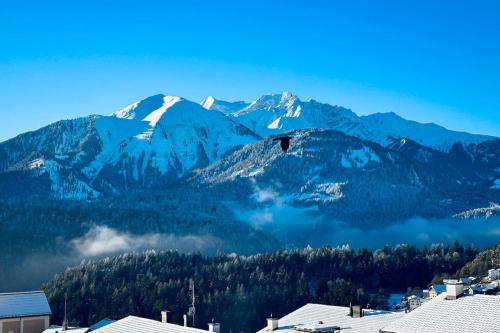 a view of a mountain range with snow covered mountains at Luxury family Chalet with extraordinary Mountain views in Trin