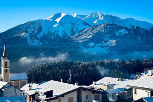 a view of a mountain range with snow covered mountains at Luxury family Chalet with extraordinary Mountain views in Trin
