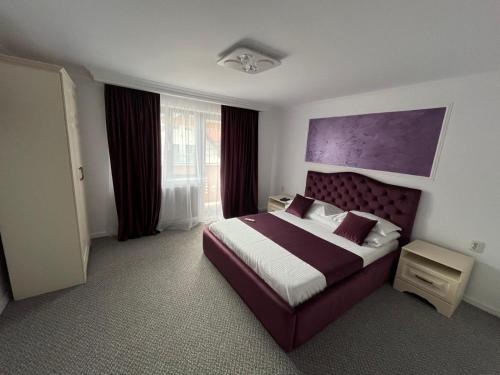 En eller flere senge i et værelse på CASA COCA - La 100 m de Strandul Arinis si 200m de CENTRU - Gura Humorului