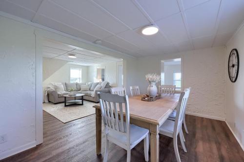 a dining room and living room with a table and chairs at Homestead Haven in Gettysburg