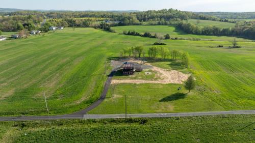 an aerial view of a house in a field at Homestead Haven in Gettysburg