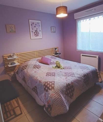 Ένα ή περισσότερα κρεβάτια σε δωμάτιο στο Chambre d'hôtes