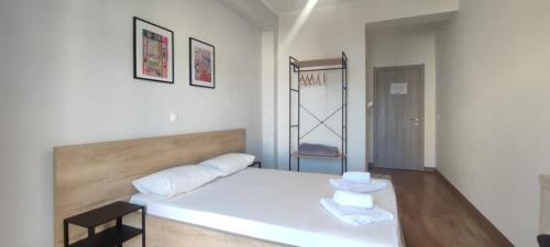 Postel nebo postele na pokoji v ubytování Duka Rooms