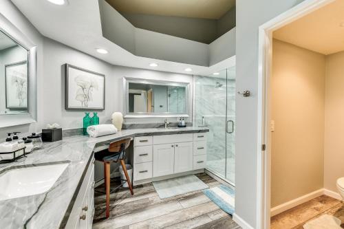 a bathroom with a sink and a shower at Pool Access Newly Renovated Palm Desert Condo in Palm Desert