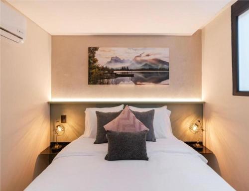 Postel nebo postele na pokoji v ubytování Obo Hotel
