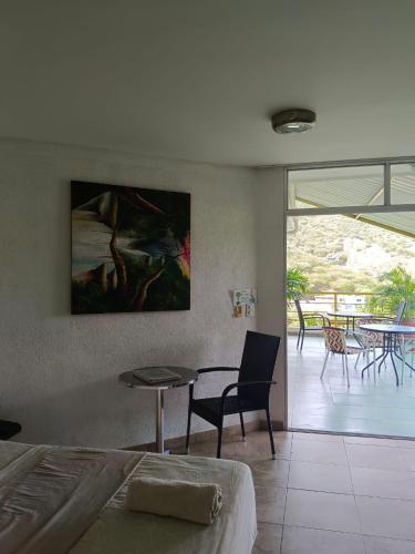 Posezení v ubytování Mauka Oasis Taganga