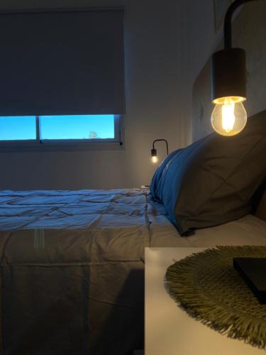 Ένα ή περισσότερα κρεβάτια σε δωμάτιο στο Como en casa