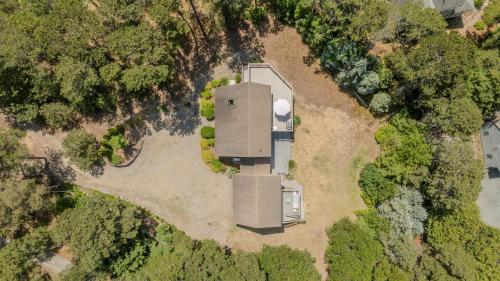 an overhead view of a building in the woods at Walk to Pond 2 Min Drive to Beach in Eastham