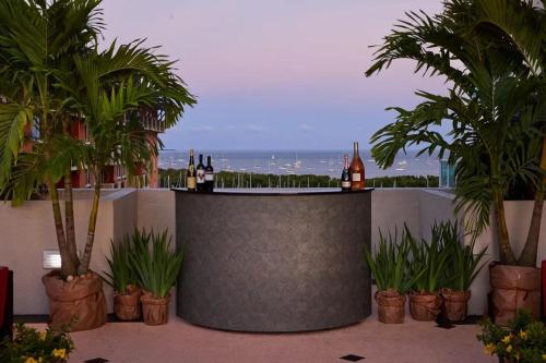 a bar with bottles of wine on top of a building at Private Oasis at Arya in Miami