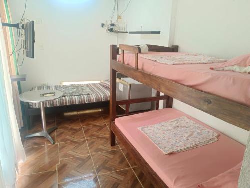 Postel nebo postele na pokoji v ubytování Mauka Oasis Taganga