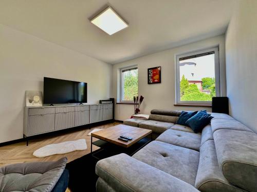 Televisyen dan/atau pusat hiburan di Apartament Pod Wiatrakiem