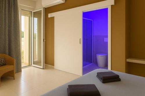 a room with a door with a purple doorway at La Dimora degli Artisti in Pescara