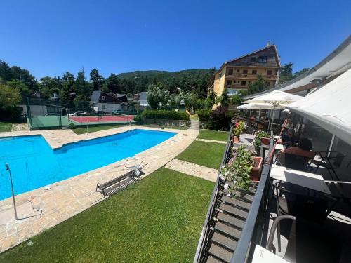 arial view of a swimming pool on a house at Navacerrada, Peace and Pool in Navacerrada