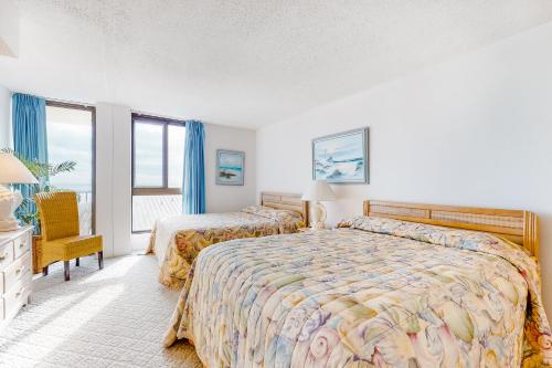 Ένα ή περισσότερα κρεβάτια σε δωμάτιο στο Sea Colony - 404 Brandywine House Rd