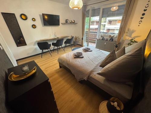 a living room with a couch and a table at BOHO Apartment Elegance in Bad Reichenhall