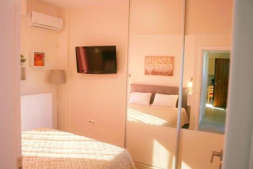 Ένα ή περισσότερα κρεβάτια σε δωμάτιο στο Ellie's guesthouse, Nafplio