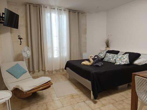 Postel nebo postele na pokoji v ubytování Cosy Arles