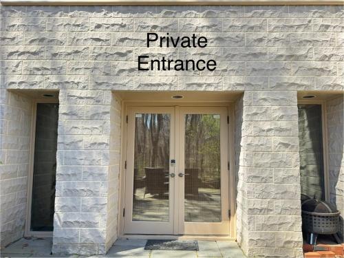 an entrance to a private entrance to a brick building at Zen House in Princeton