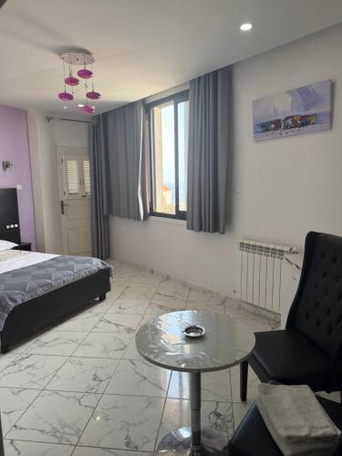 Ένα ή περισσότερα κρεβάτια σε δωμάτιο στο MARIN Hôtel