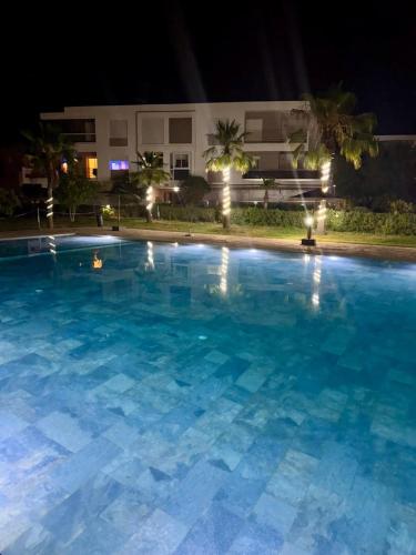 Bazén v ubytování Appartement vue sur mer imiwaddar nebo v jeho okolí