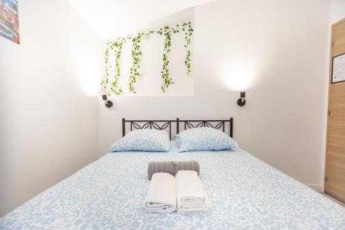 Katil atau katil-katil dalam bilik di Charming Cosy Studio in Beziers town centre