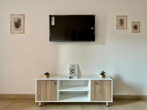 TV a/nebo společenská místnost v ubytování Rent Apart San Lorenzo
